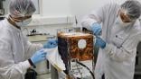 technicians at small-satellite production specialist Hemeria