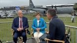 Sen. Jerry Moran (R-Kansas), left, and Sen. Jeanne Shaheen (D-N.H.), right, speak at the Farnborough International Air Show.