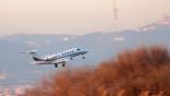 Embraer Phenom 300 in flight