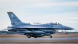 F-16 fighter landing on runway