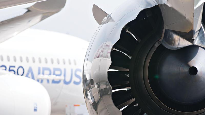 engine of Qatar Airways Boeing 787 Dreamliner with Airbus A350 XWB in background